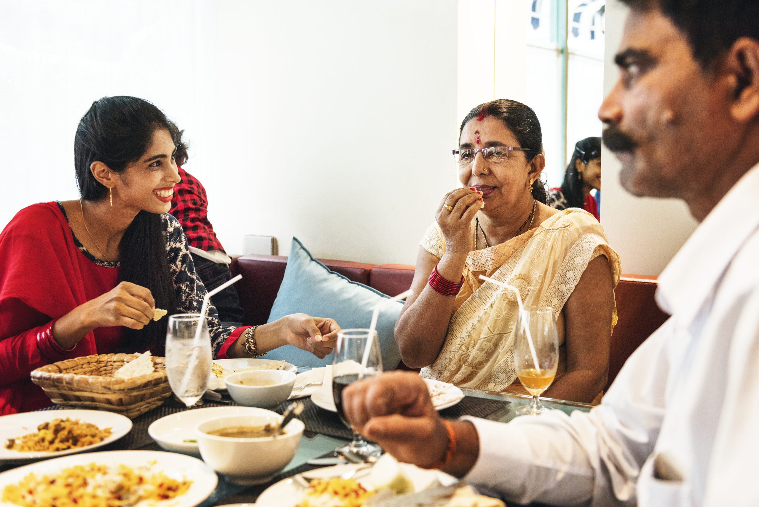 family having indian food scaled